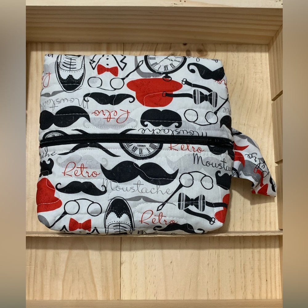 Zippered Quilted Shave-themed Bag